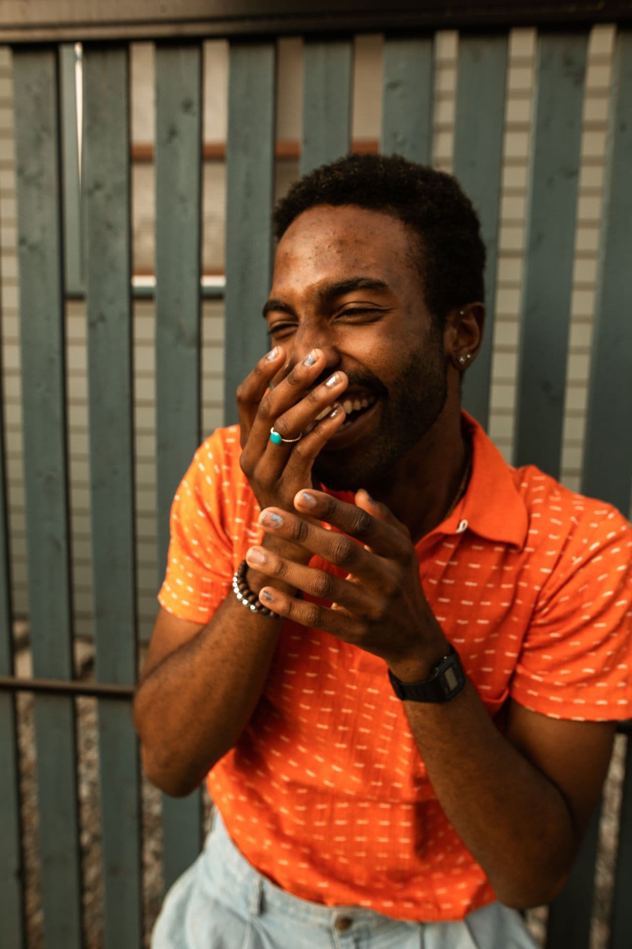 A man sharing a spontaneous moment of laughter